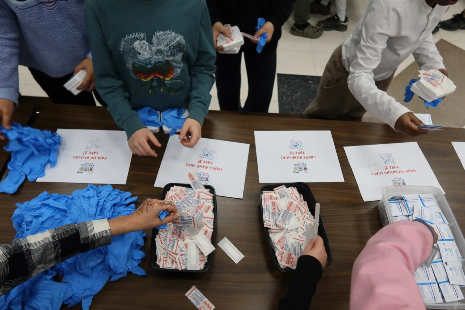 Students building care kits at Dicken Elementary workshop